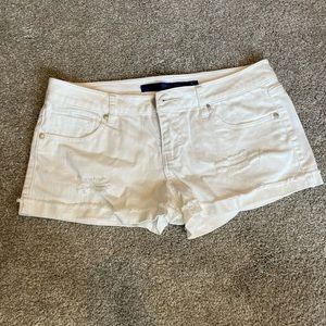 White distressed jean shorts